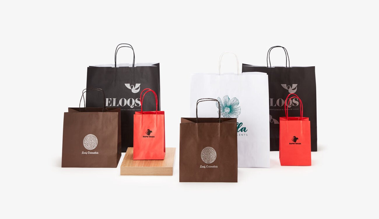 Custom paper bags printed with a brand logo
